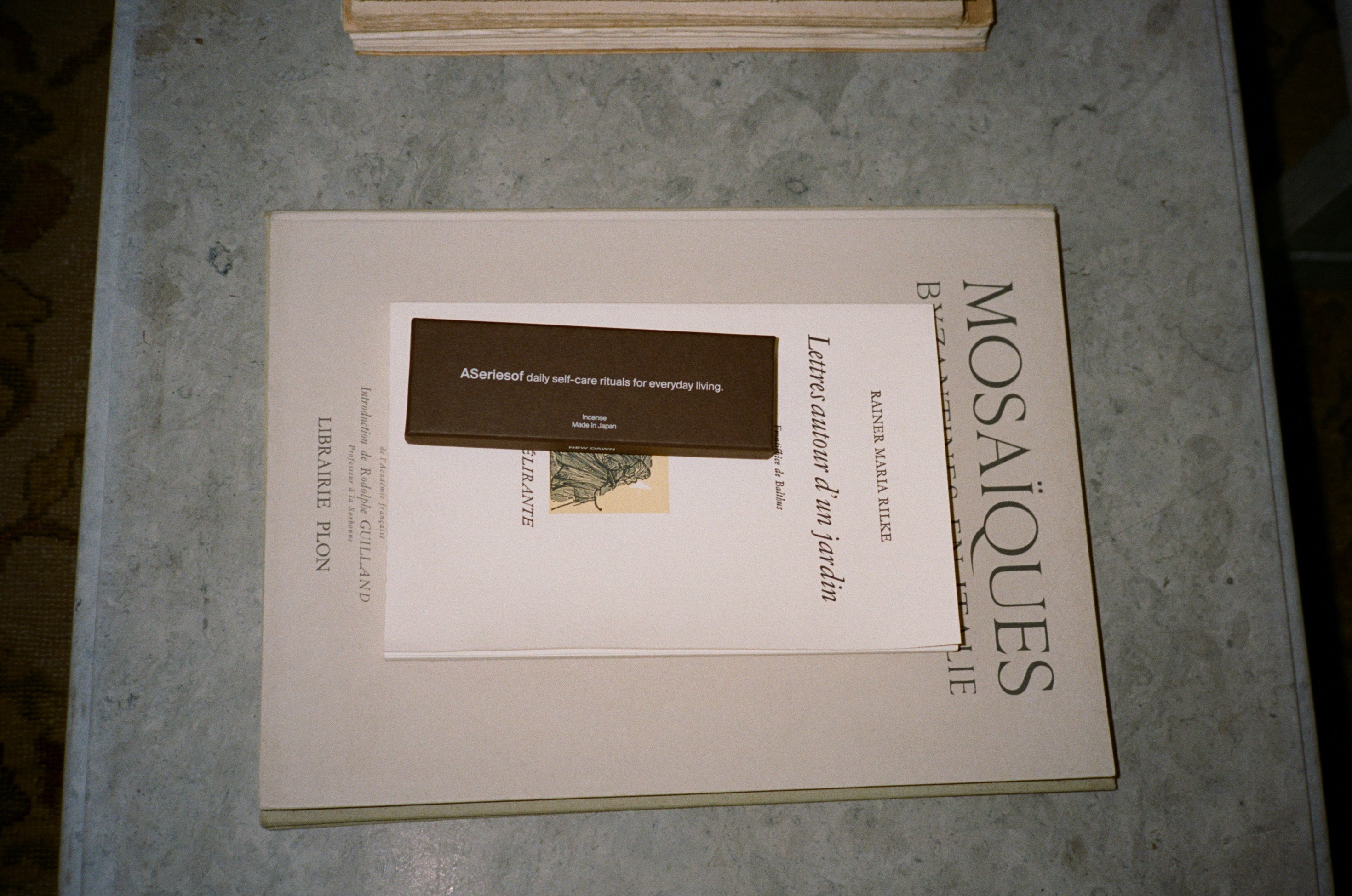 Japanese Incense sticks box made in Japan on top of books in a luxury hotel.