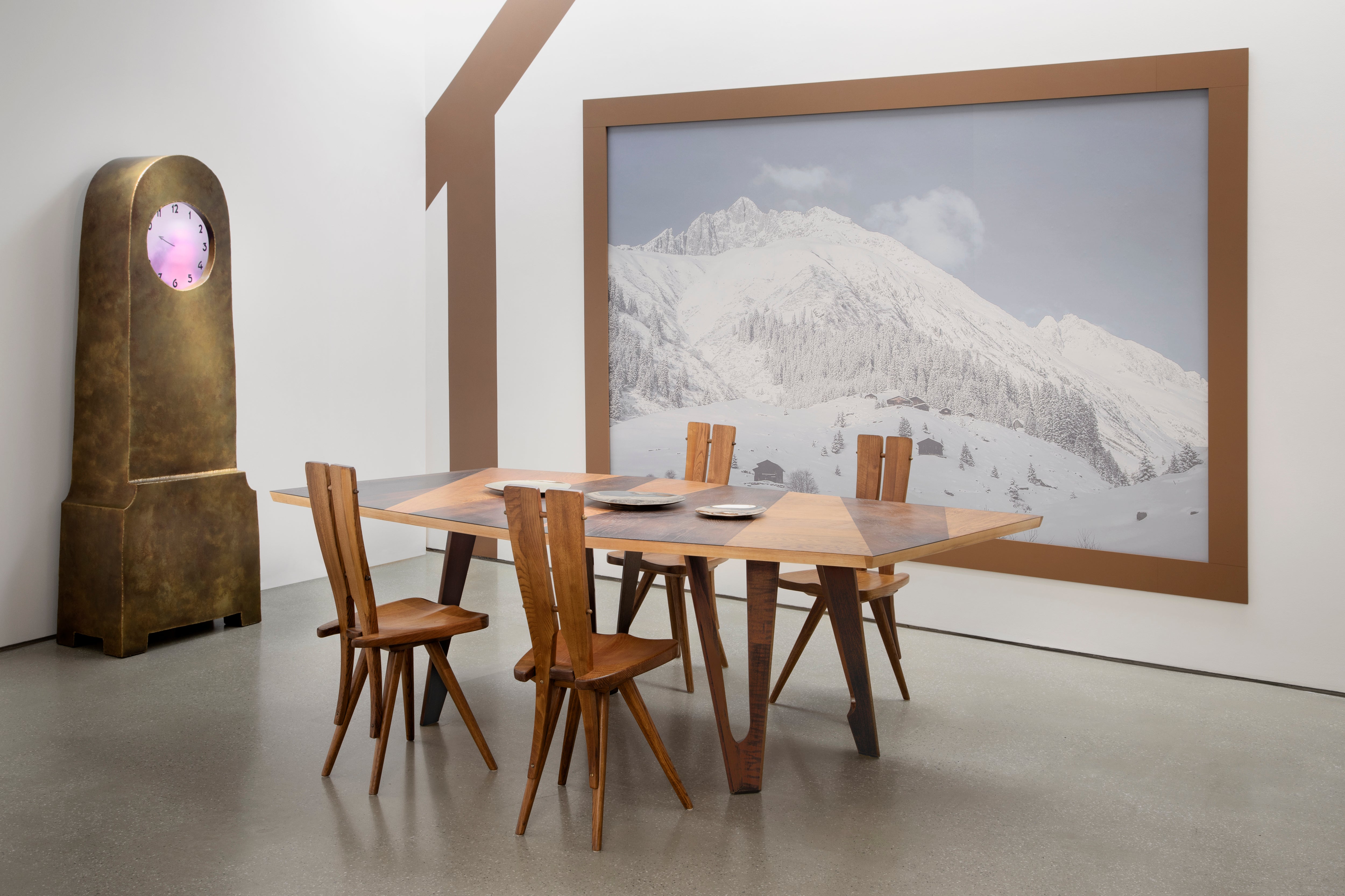 Carpenter Workshop Gallery Paris exhibition, chairs table and clock.